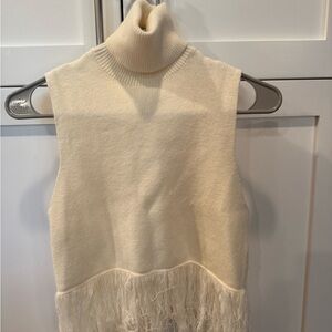 Elegant Cream Turtleneck Sweater with Fringe